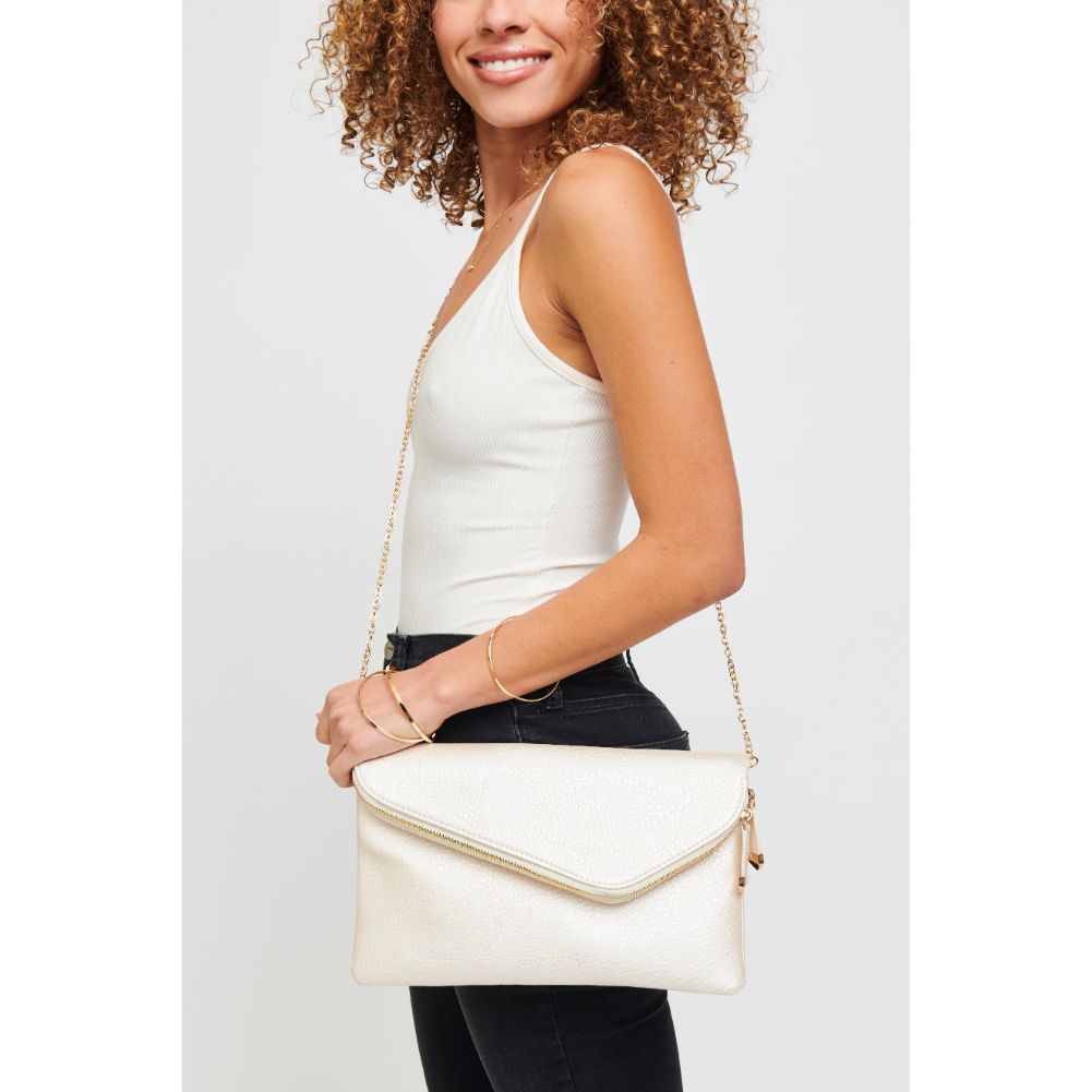 Woman wearing Pearl Gold Urban Expressions Stella Clutch 840611151575 View 1 | Pearl Gold