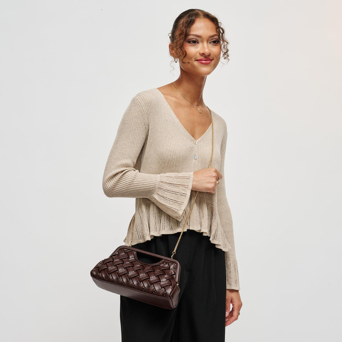 Woman wearing Chocolate Urban Expressions Alouette Clutch 840504211522 View 2 | Chocolate