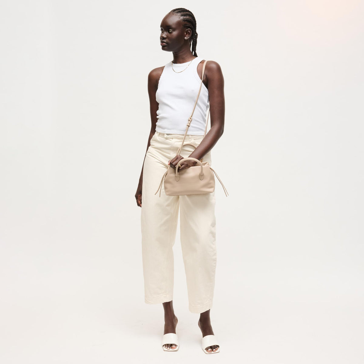 Woman wearing Stone Urban Expressions Logan Crossbody 840504205378 View 2 | Stone