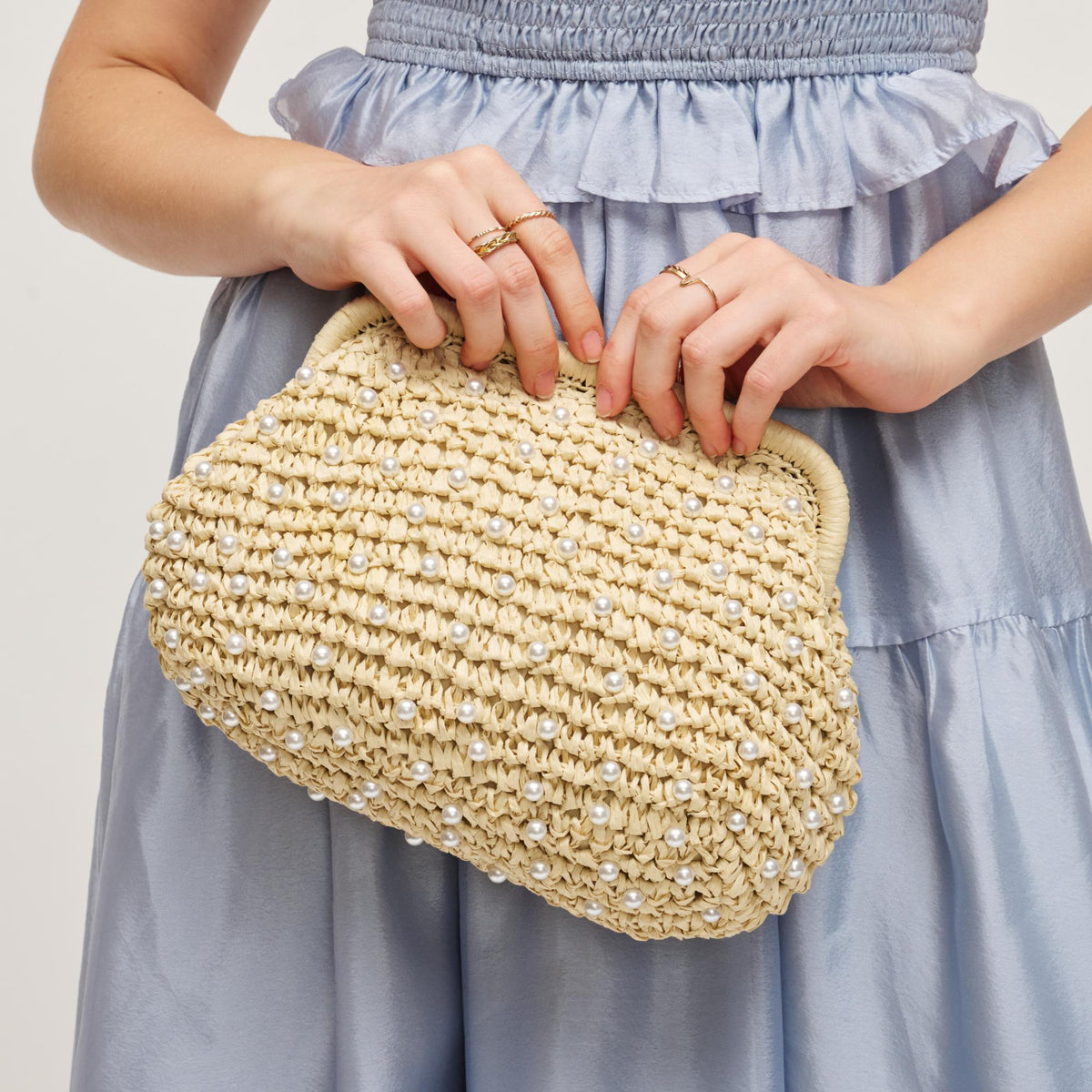 Woman wearing Ivory Urban Expressions Whitlow Clutch 840504209345 View 1 | Ivory