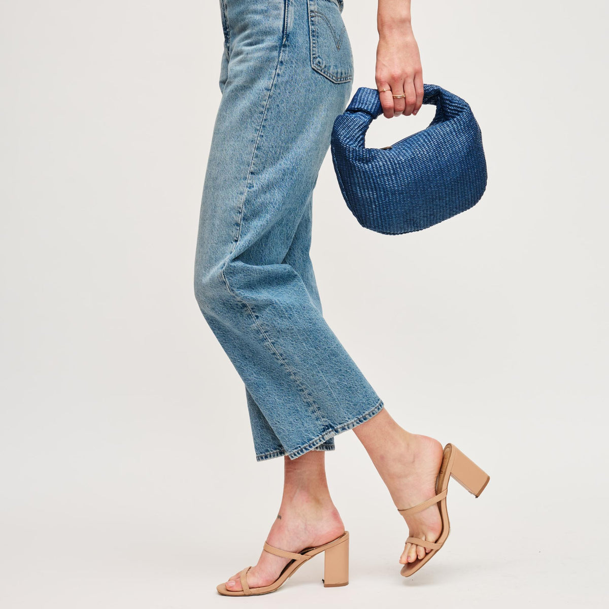 Woman wearing Navy Urban Expressions Tracy - Stripes Clutch 840611141699 View 4 | Navy
