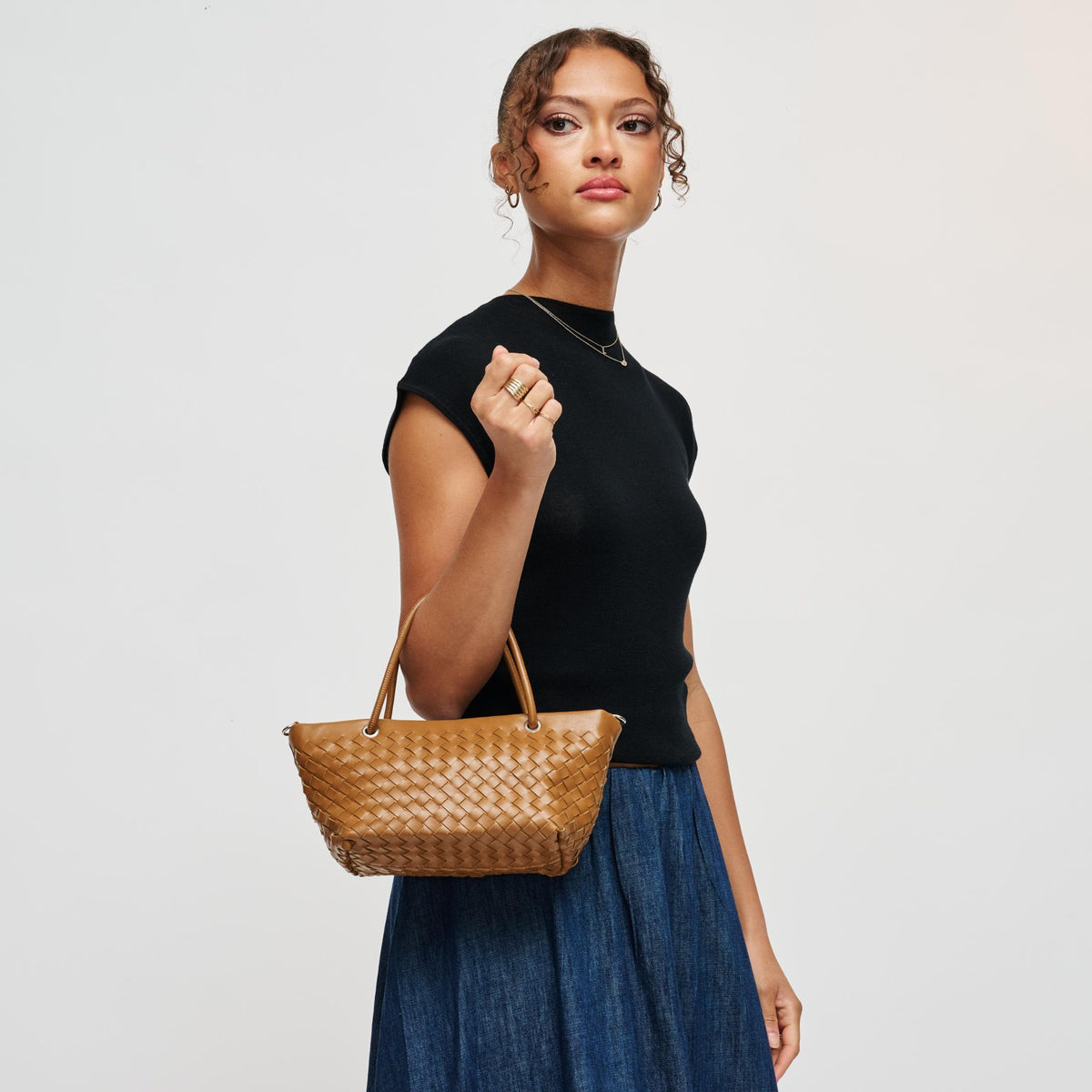 Woman wearing Cognac Urban Expressions Otto Crossbody 840504214066 View 1 | Cognac