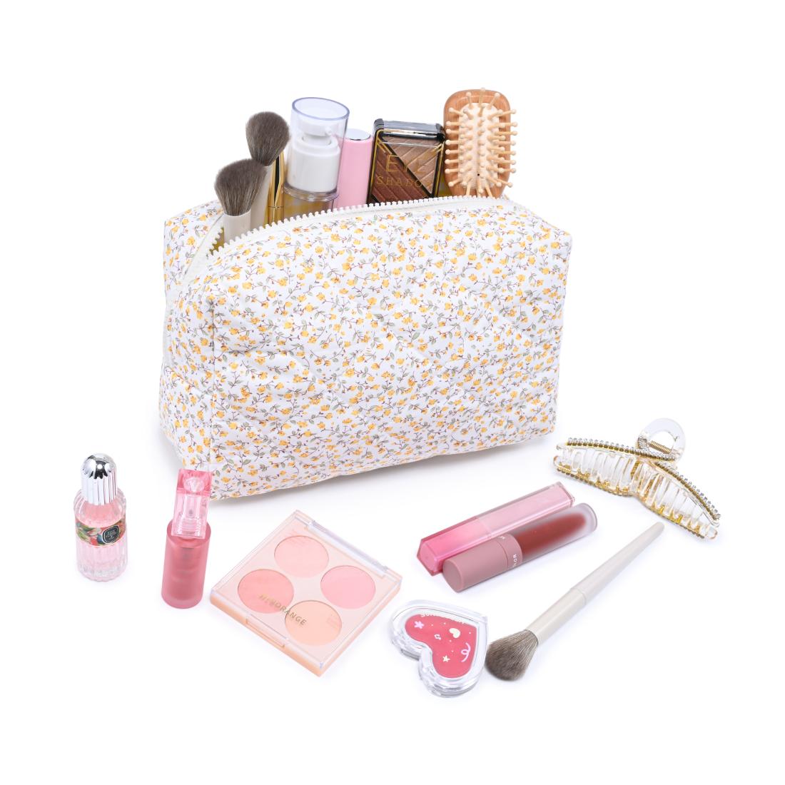 Woman wearing Soft Blush Floral Urban Essentials Garden Glow Cosmetic & Travel Organizer Pouch 840504209888 View 1 | Soft Blush Floral