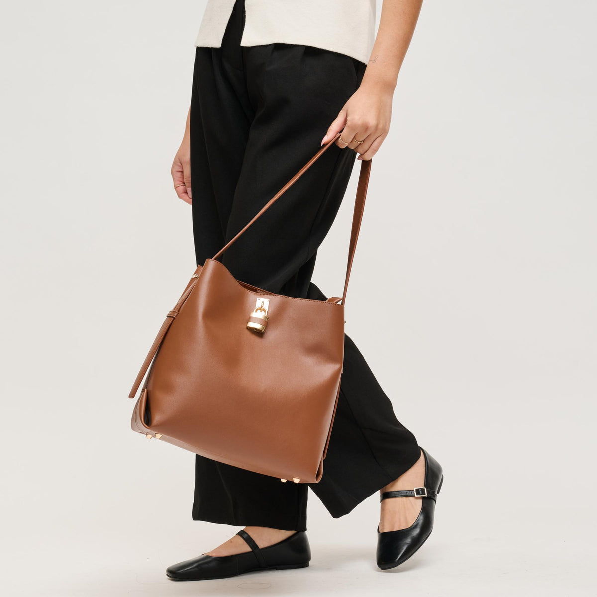 Woman wearing Chocolate Urban Expressions Caroline Hobo 840504208348 View 1 | Chocolate
