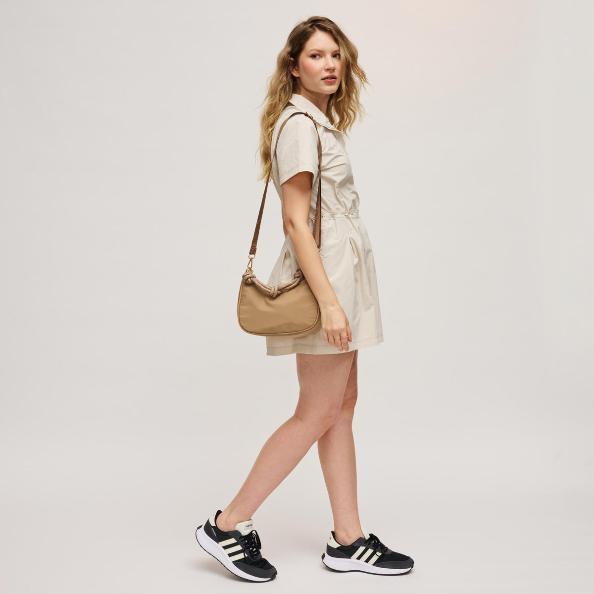 Woman wearing Nude Urban Expressions Joannie Crossbody 840504208706 View 4 | Nude