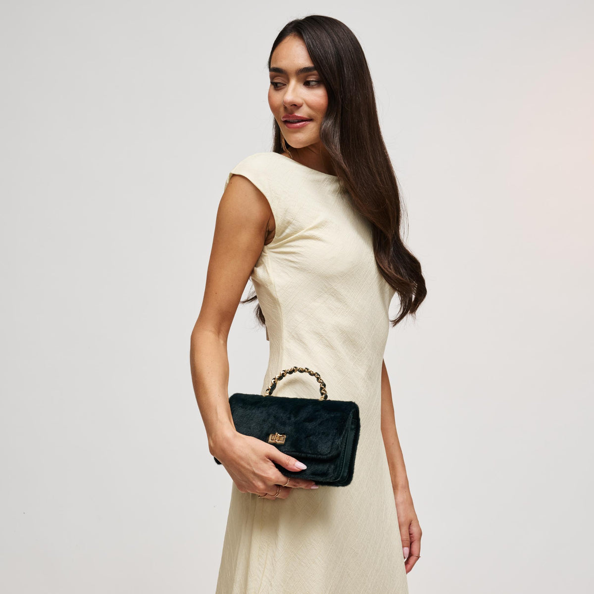 Woman wearing Emerald Urban Expressions Lulu - Fur Crossbody 840504212413 View 2 | Emerald