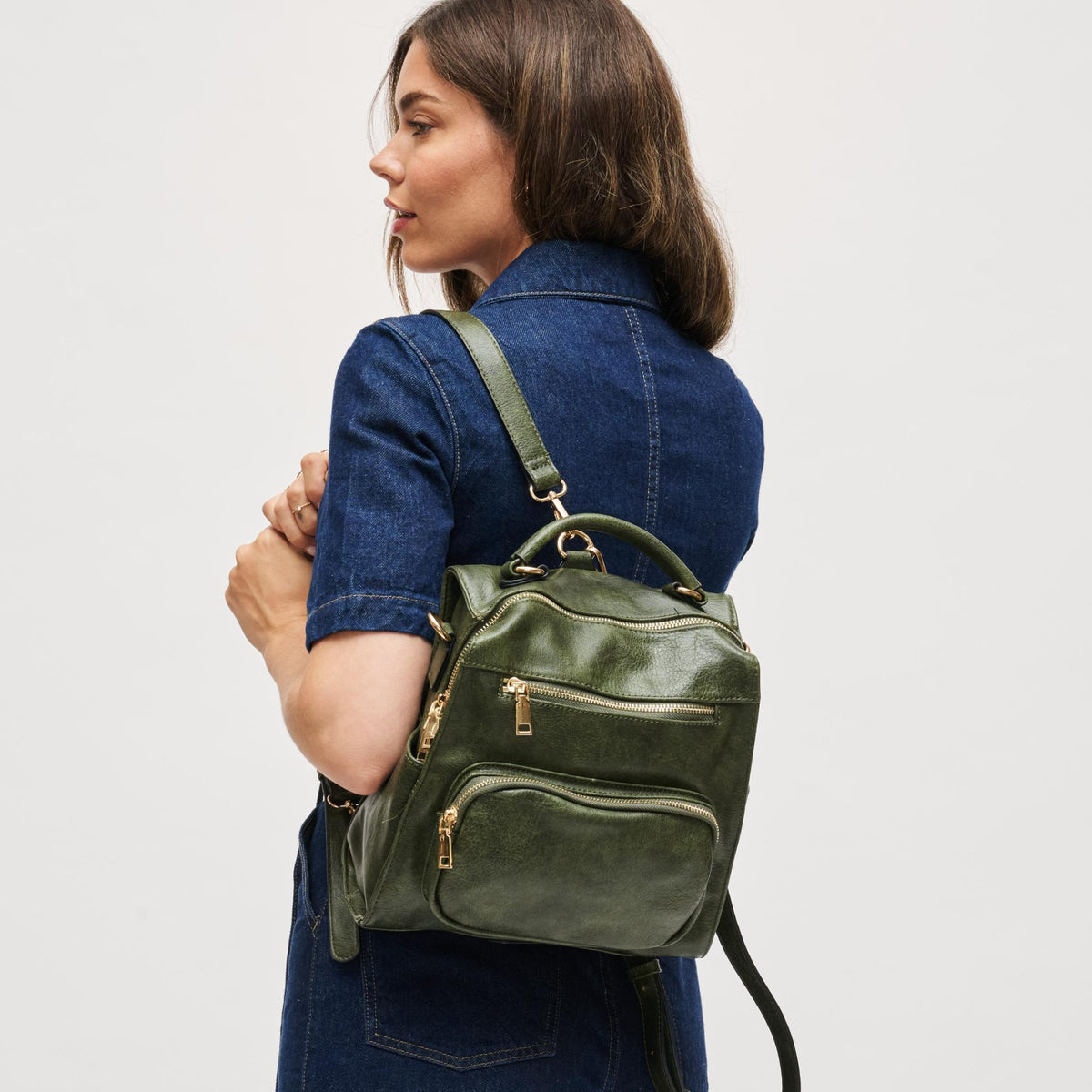 Woman wearing Olive Urban Expressions Miles Backpack NA-840611166753 View 1 | Olive