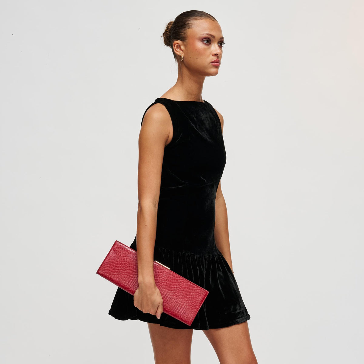 Woman wearing Red Urban Expressions Nazlee - Snake Clutch 840504212598 View 3 | Red
