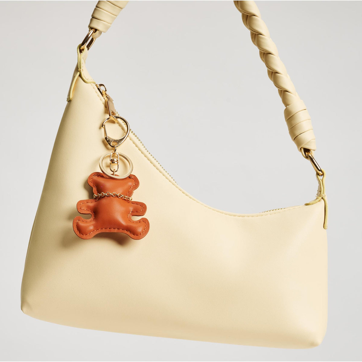 Woman wearing Tan Urban Expressions Bear Keychain Charm 840611150752 View 2 | Tan