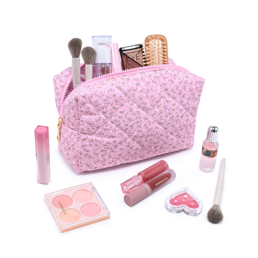 Woman wearing Soft Blush Floral Urban Essentials Garden Glow Cosmetic & Travel Organizer Pouch 840504209888 View 1 | Soft Blush Floral