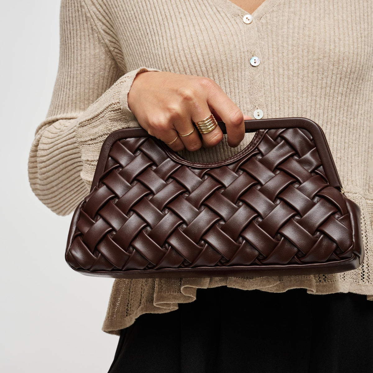Woman wearing Chocolate Urban Expressions Alouette Clutch 840504211522 View 1 | Chocolate