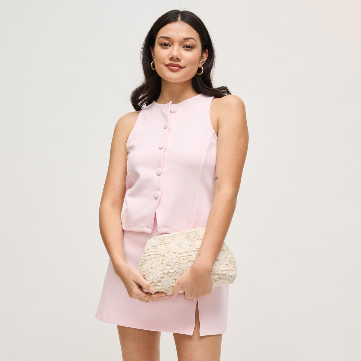 Woman wearing Ivory Urban Expressions Ophelia Clutch 840504204487 View 4 | Ivory