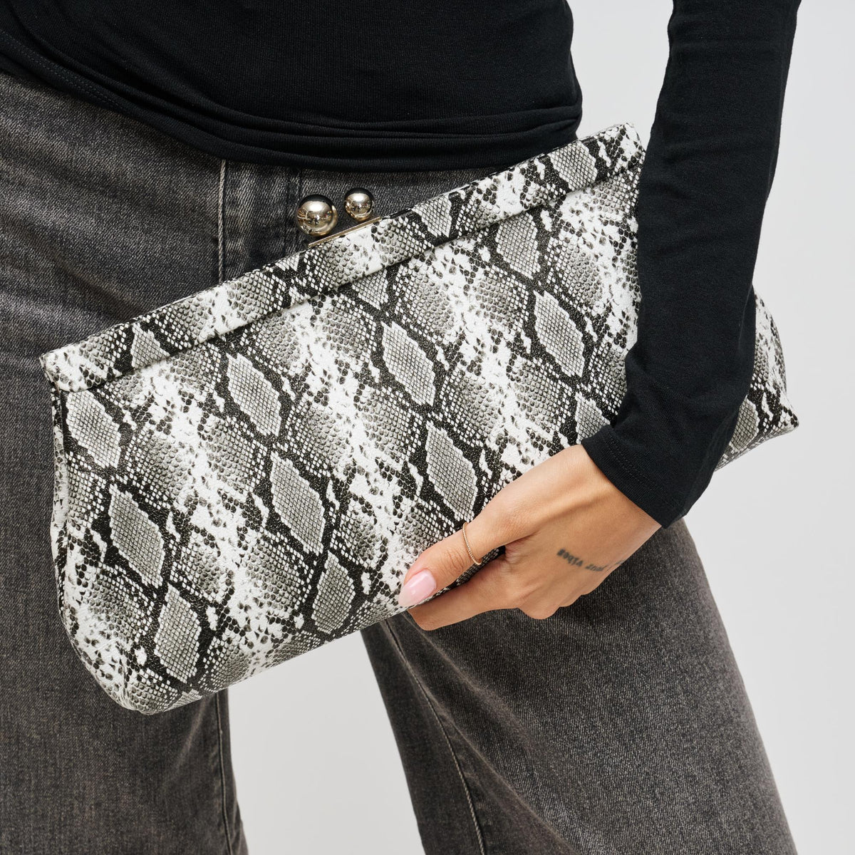 Woman wearing Black White Urban Expressions Joplin - Kisslock Clutch 840504200779 View 1 | Black White