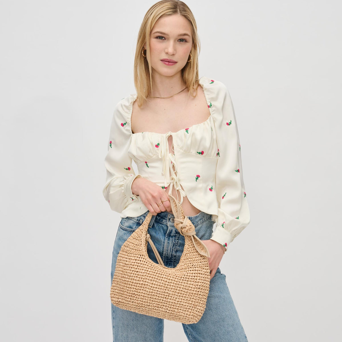 Woman wearing Natural Urban Expressions Maple Clutch 840611191366 View 1 | Natural