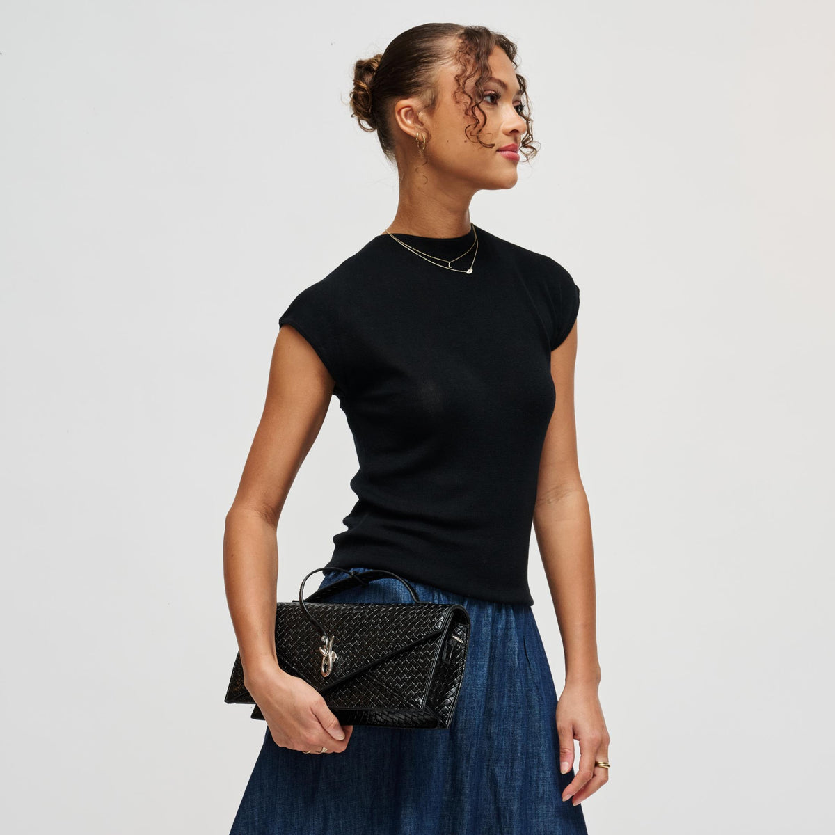 Woman wearing Black Urban Expressions Khaleesi Clutch 840504211874 View 3 | Black