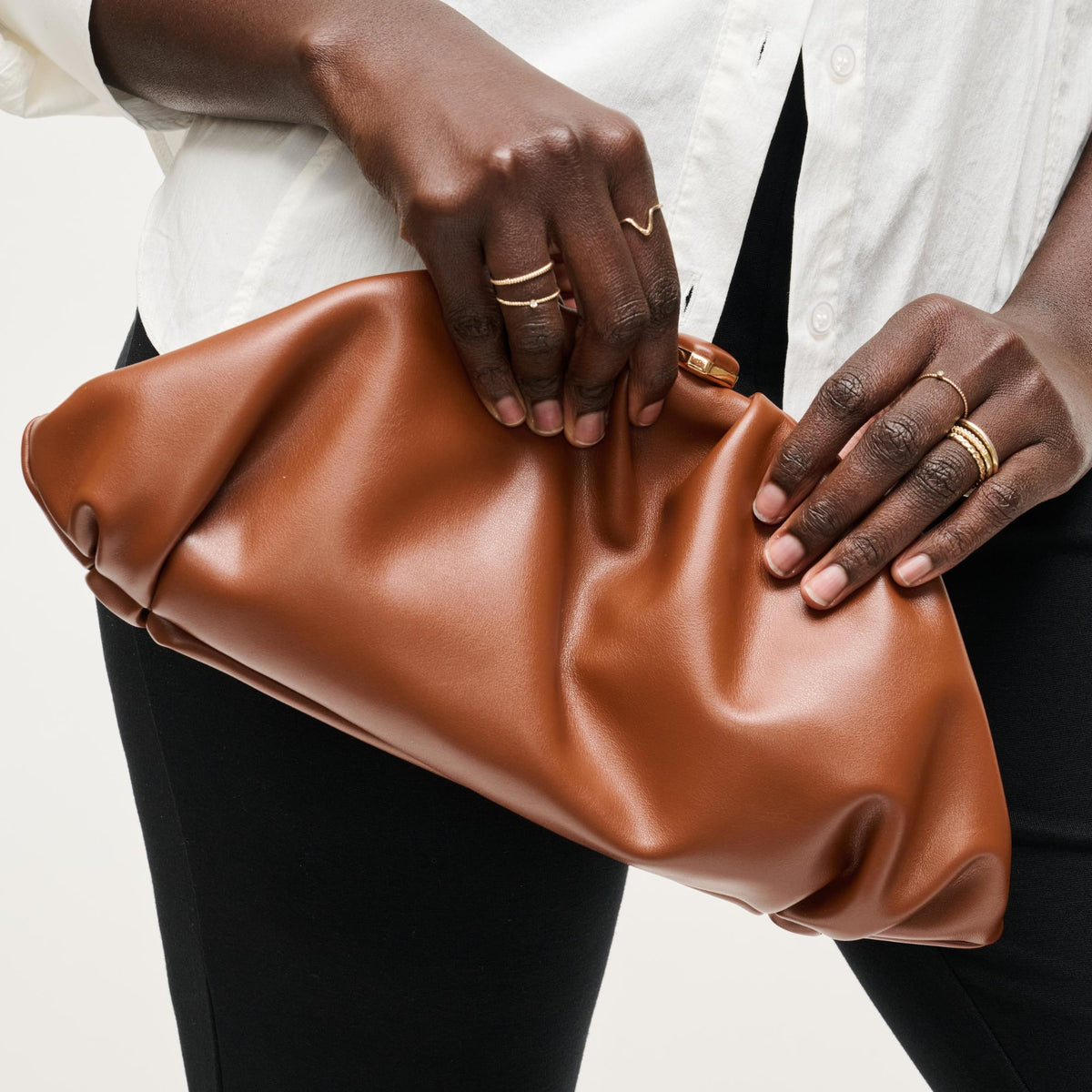 Woman wearing Chocolate Urban Expressions Jennifer Clutch 840504208249 View 1 | Chocolate