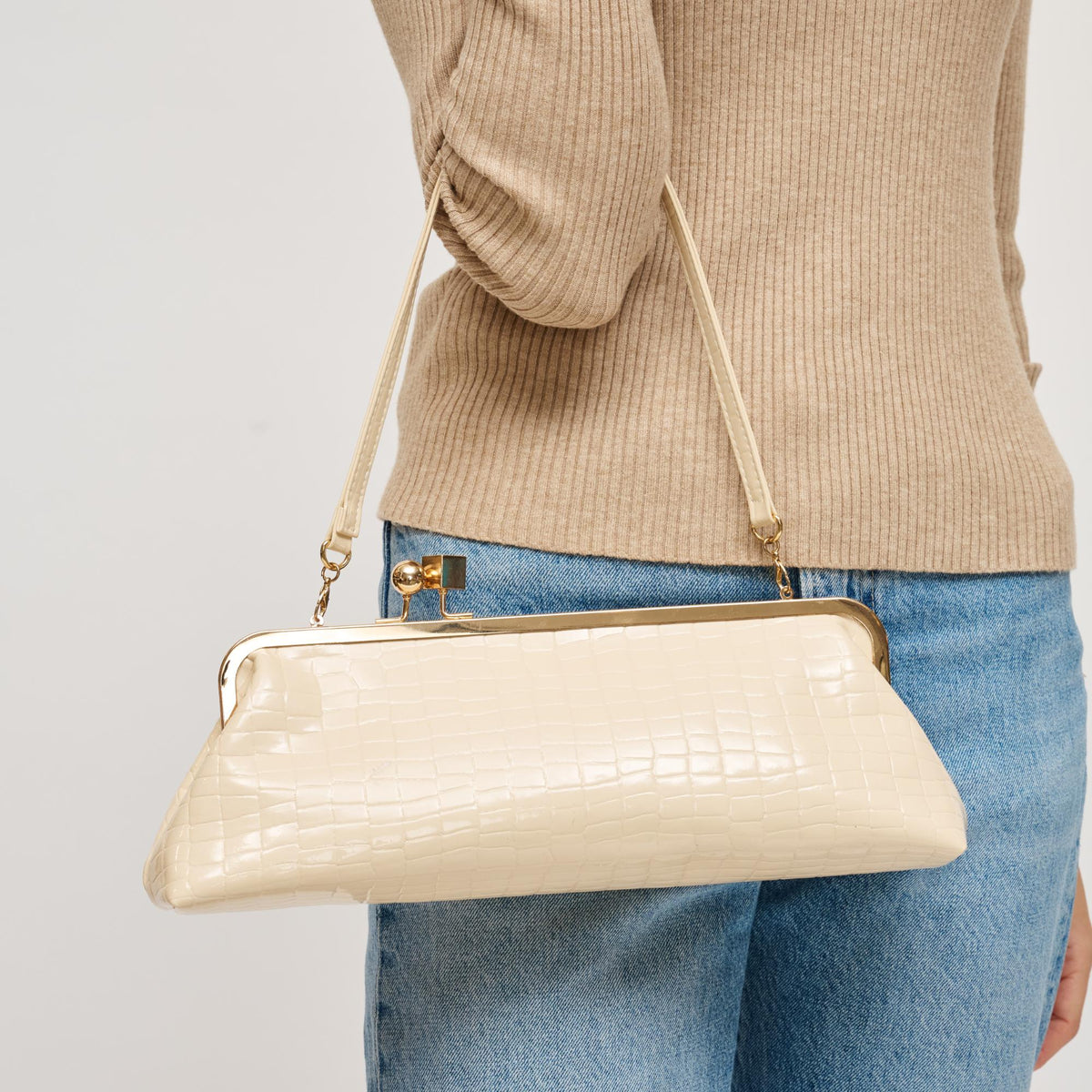 Woman wearing Cream Urban Expressions Piper Clutch 840504200755 View 1 | Cream