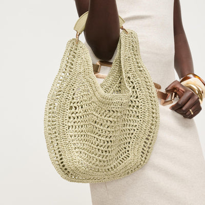Woman wearing Sage Urban Expressions Camden Hobo 840504204500 View 1 | Sage