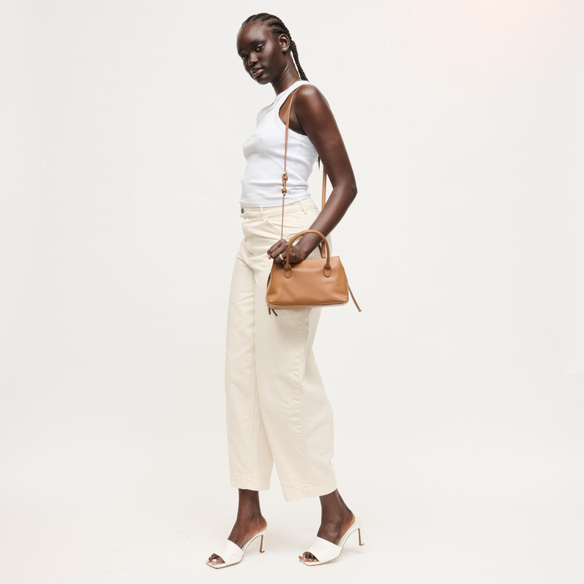 Woman wearing Camel Urban Expressions Logan Crossbody 840504205354 View 3 | Camel