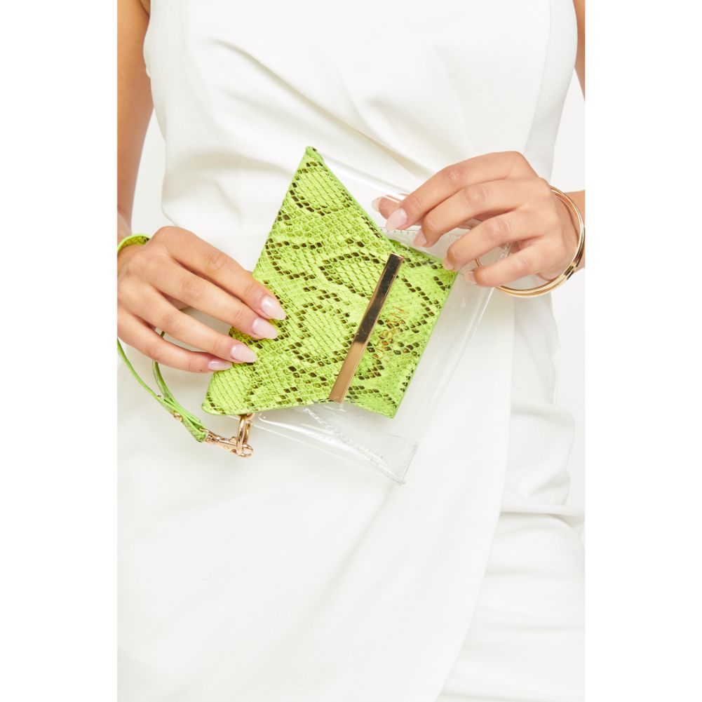 Woman wearing Neon Yellow Urban Expressions Reese - Neon Snake Wristlet 840611163455 View 2 | Neon Yellow
