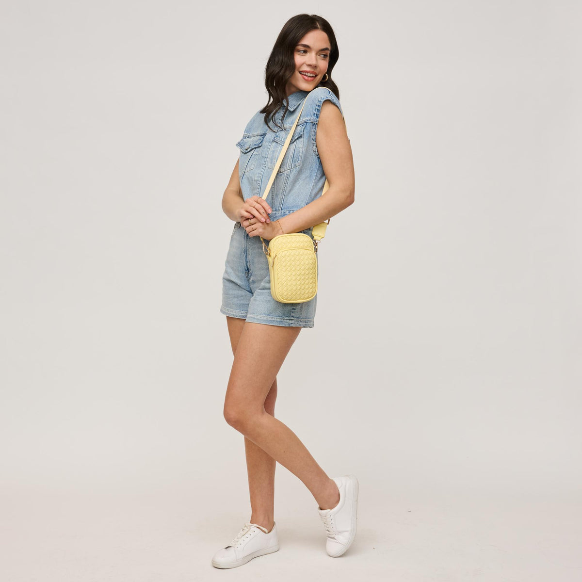Woman wearing Butter Urban Expressions Celeste Crossbody 840611147707 View 3 | Butter