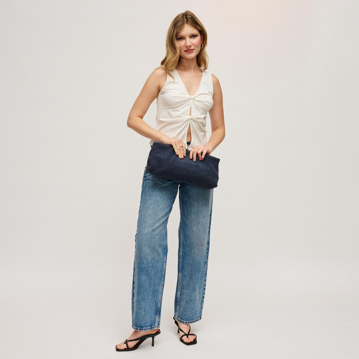 Woman wearing Navy Urban Expressions Franny - Seasonal Clutch 840504203527 View 4 | Navy