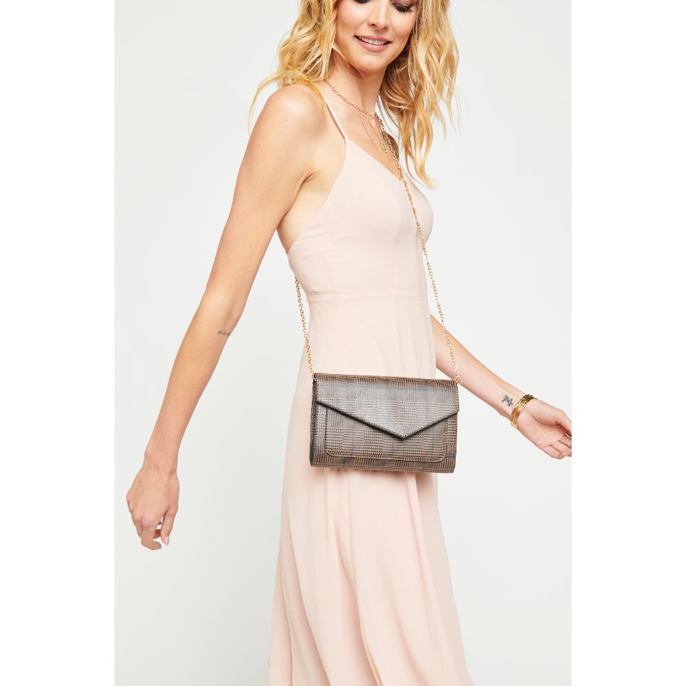 Woman wearing Nutmeg Urban Expressions Xavier Clutch NA-840611156631 View 1 | Nutmeg