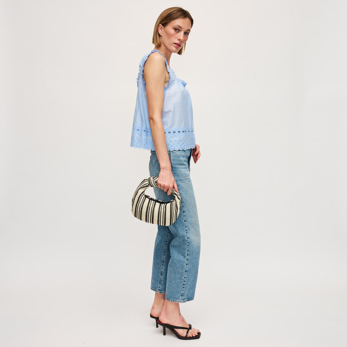 Woman wearing Black White Urban Expressions Tracy - Stripes Clutch 840611141651 View 3 | Black White