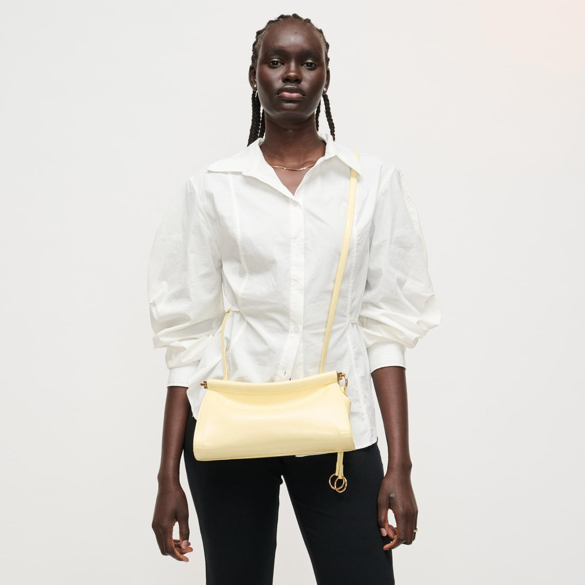 Woman wearing Butter Urban Expressions Elowyn Crossbody 840504208034 View 2 | Butter