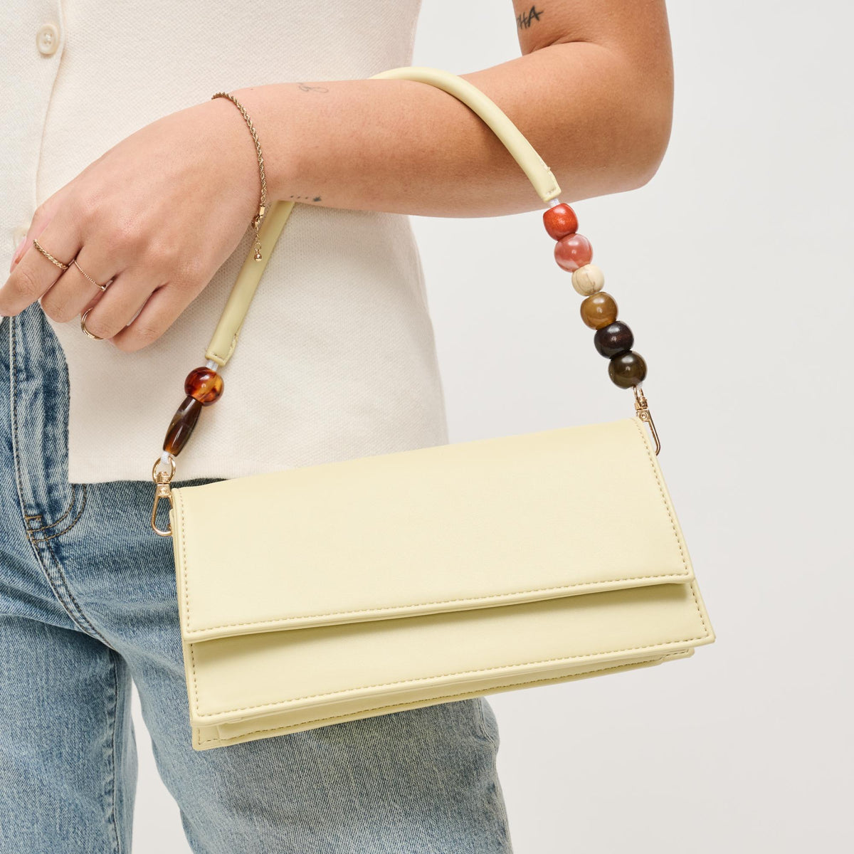 Woman wearing Butter Urban Expressions Brooks Crossbody 840504206641 View 1 | Butter
