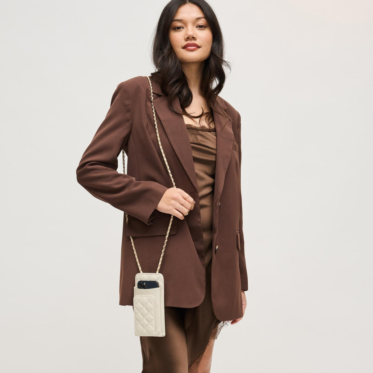 Woman wearing Ivory Urban Expressions Brianna 2.0 Cell Phone Crossbody 840504203763 View 4 | Ivory