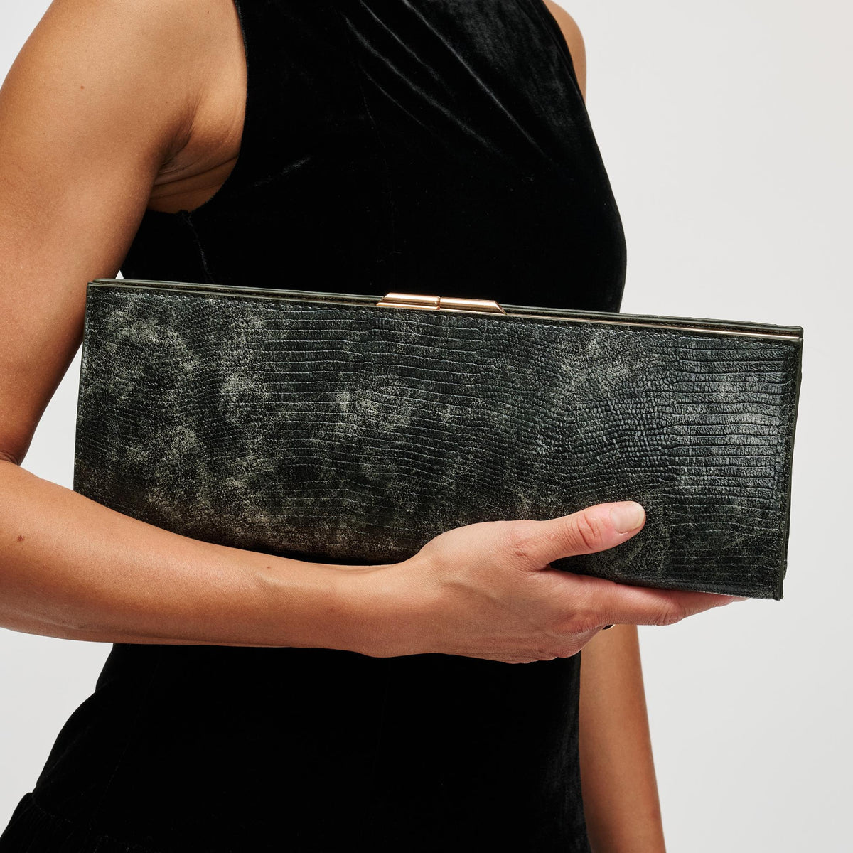 Woman wearing Green Urban Expressions Nazlee - Lizard Clutch 840504212635 View 1 | Green