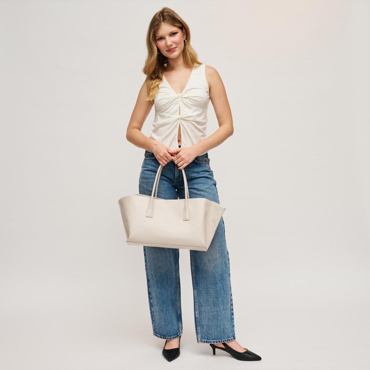 Woman wearing Bone Urban Expressions Levi Tote 840504205279 View 4 | Bone