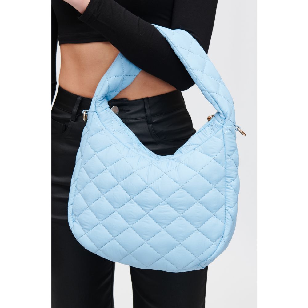 Woman wearing Baby Blue Urban Expressions Sonoma - Quilted Nylon Hobo 840611118462 View 4 | Baby Blue