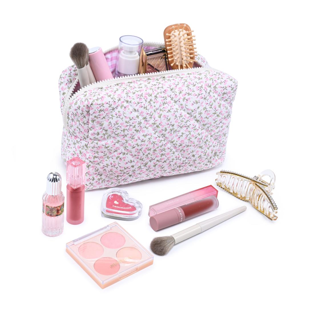 Woman wearing Soft Blush Floral Urban Essentials Garden Glow Cosmetic & Travel Organizer Pouch 840504209888 View 1 | Soft Blush Floral