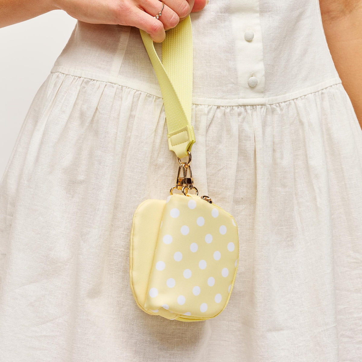 Woman wearing Yellow Urban Expressions Link & Carry - Polka Dot Wristlet 840504202711 View 1 | Yellow