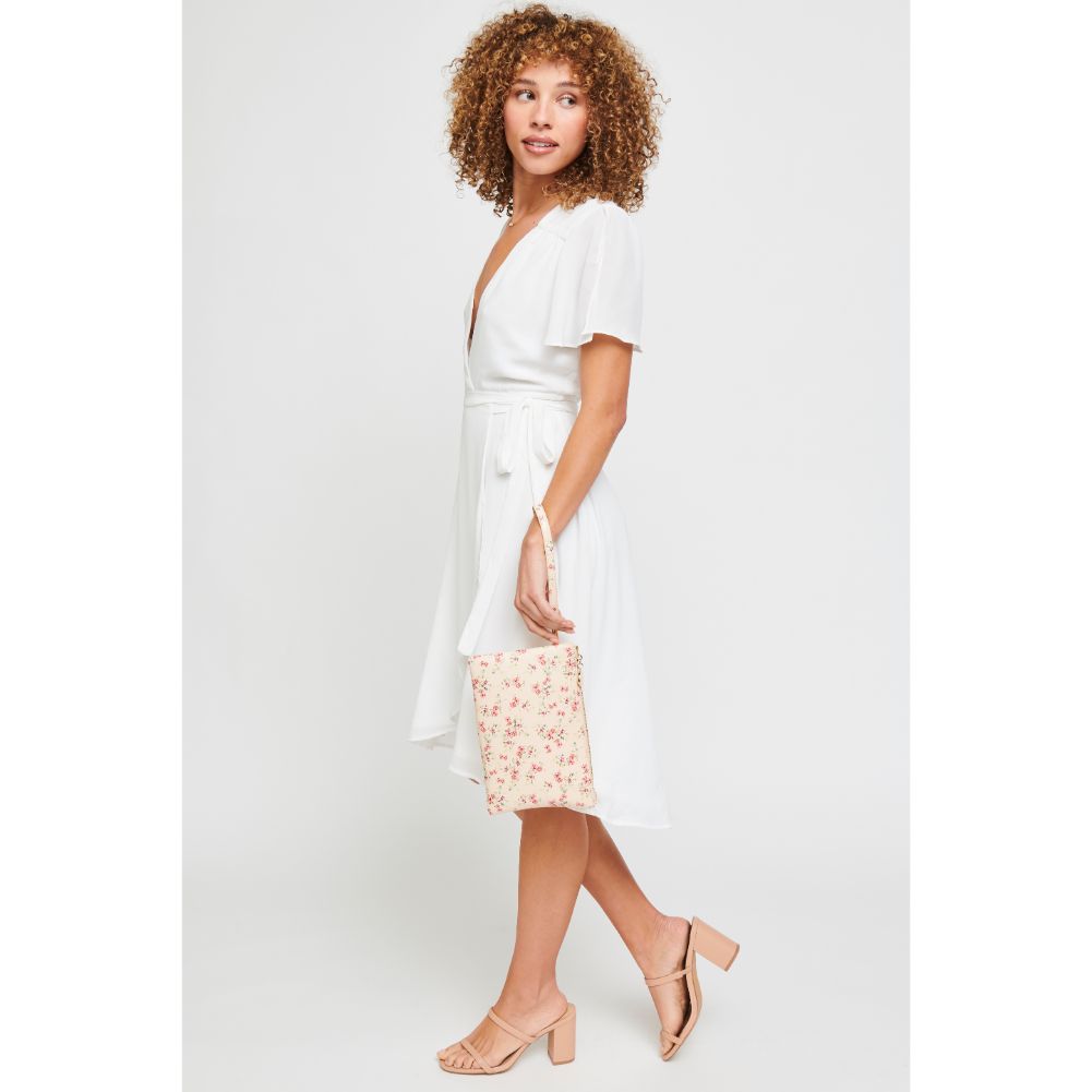 Woman wearing Cream Urban Expressions Joan Floral Wristlet 840611181138 View 3 | Cream