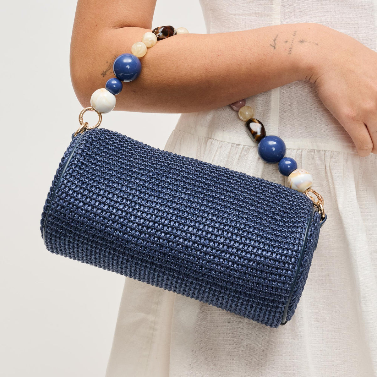 Woman wearing Navy Urban Expressions Rachel - Straw Clutch 840504206245 View 1 | Navy