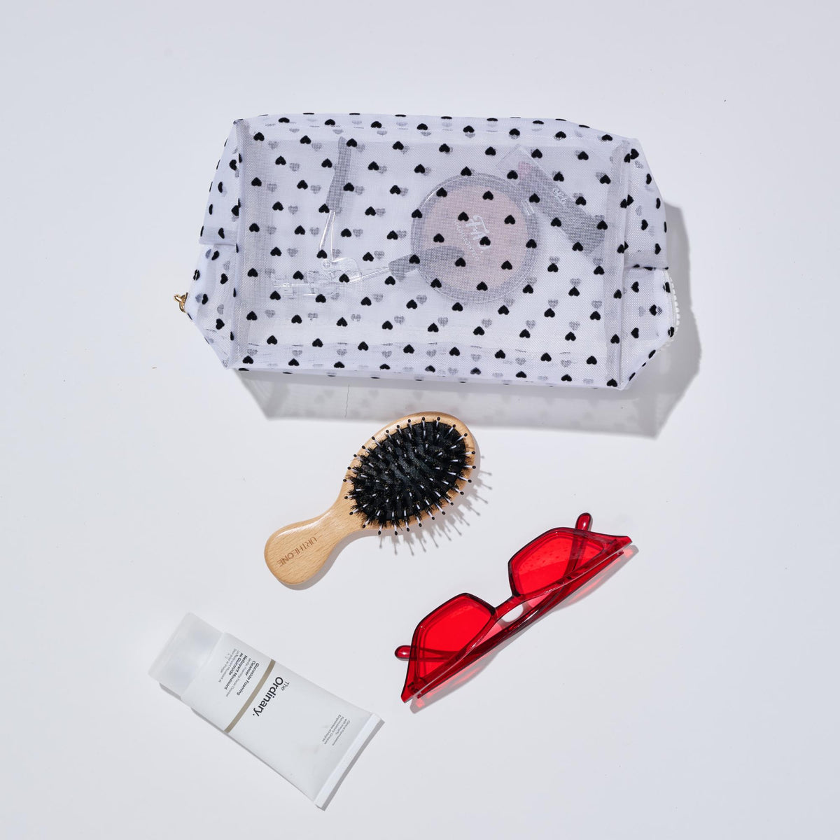Woman wearing White Urban Essentials See Through You Cosmetic & Travel Organizer Pouch 840611197054 View 1 | White