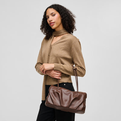 Woman wearing Chocolate Urban Expressions Ryker Satchel 840504213298 View 1 | Chocolate