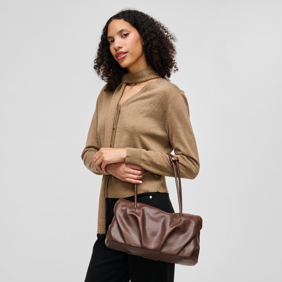 Woman wearing Chocolate Urban Expressions Ryker Satchel 840504213298 View 1 | Chocolate