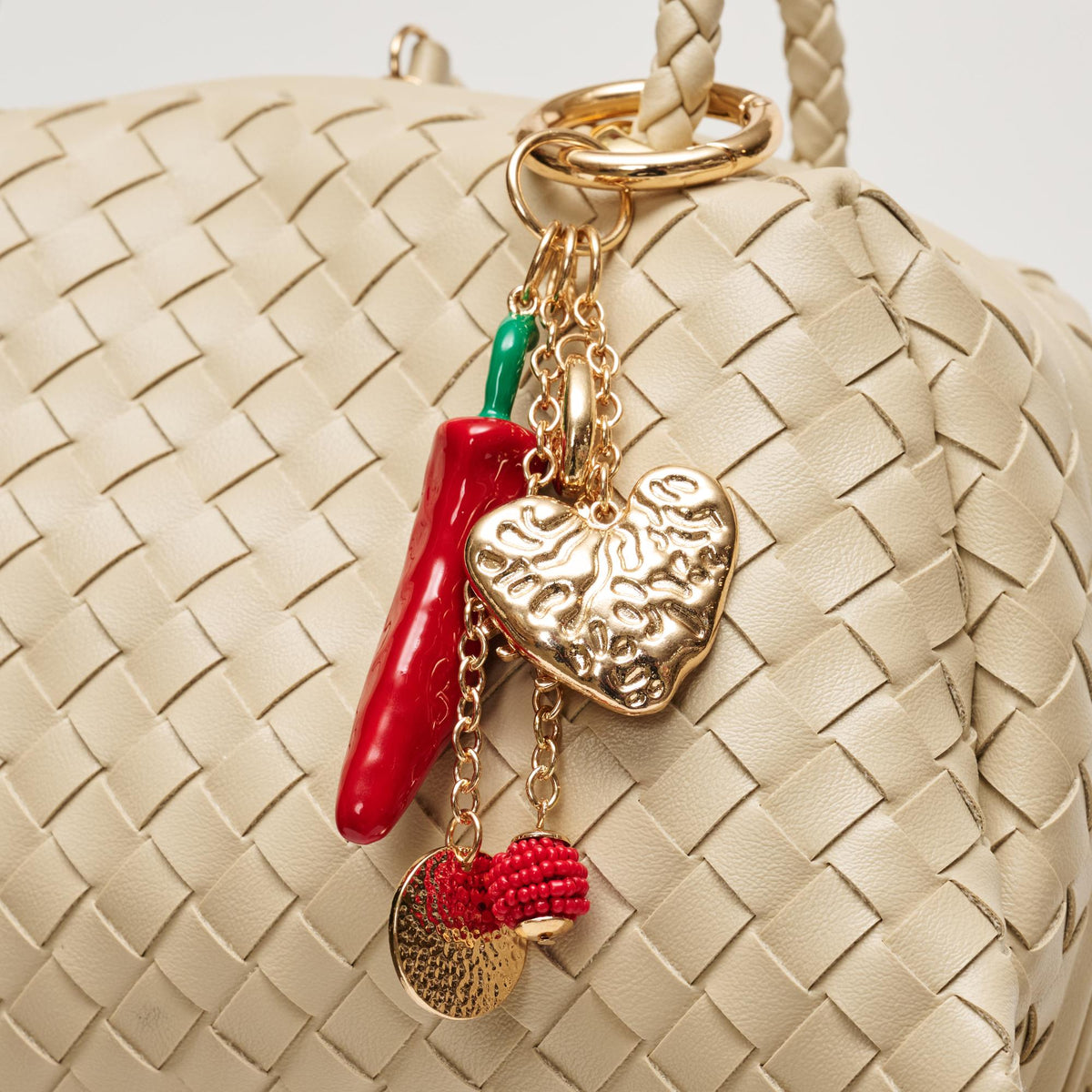 Woman wearing Gold Red Urban Expressions Chili Keychain Charm 840504209161 View 2 | Gold Red