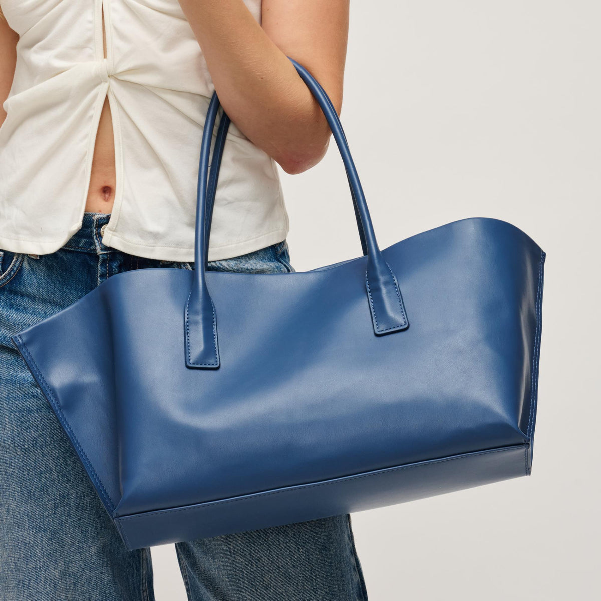 Woman wearing Denim Urban Expressions Levi Tote 840504205286 View 2 | Denim