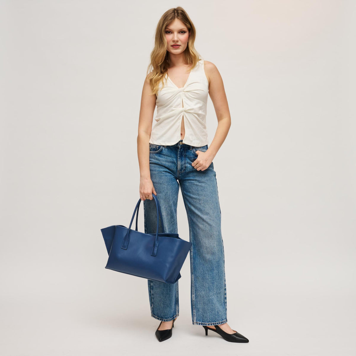 Woman wearing Denim Urban Expressions Levi Tote 840504205286 View 4 | Denim