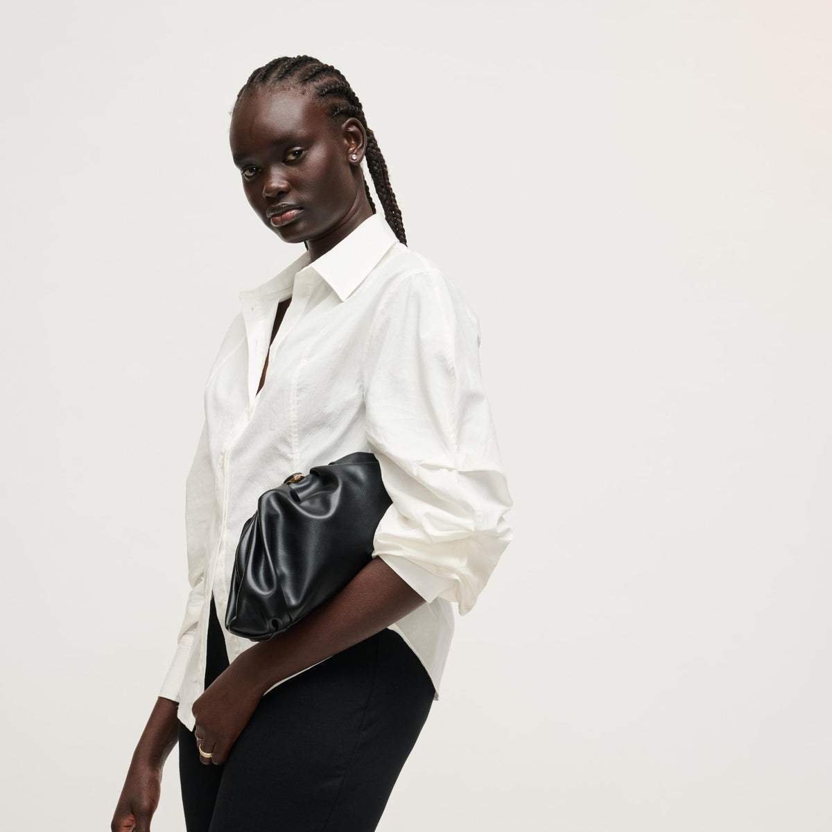 Woman wearing Black Urban Expressions Jennifer Clutch 840504208201 View 1 | Black