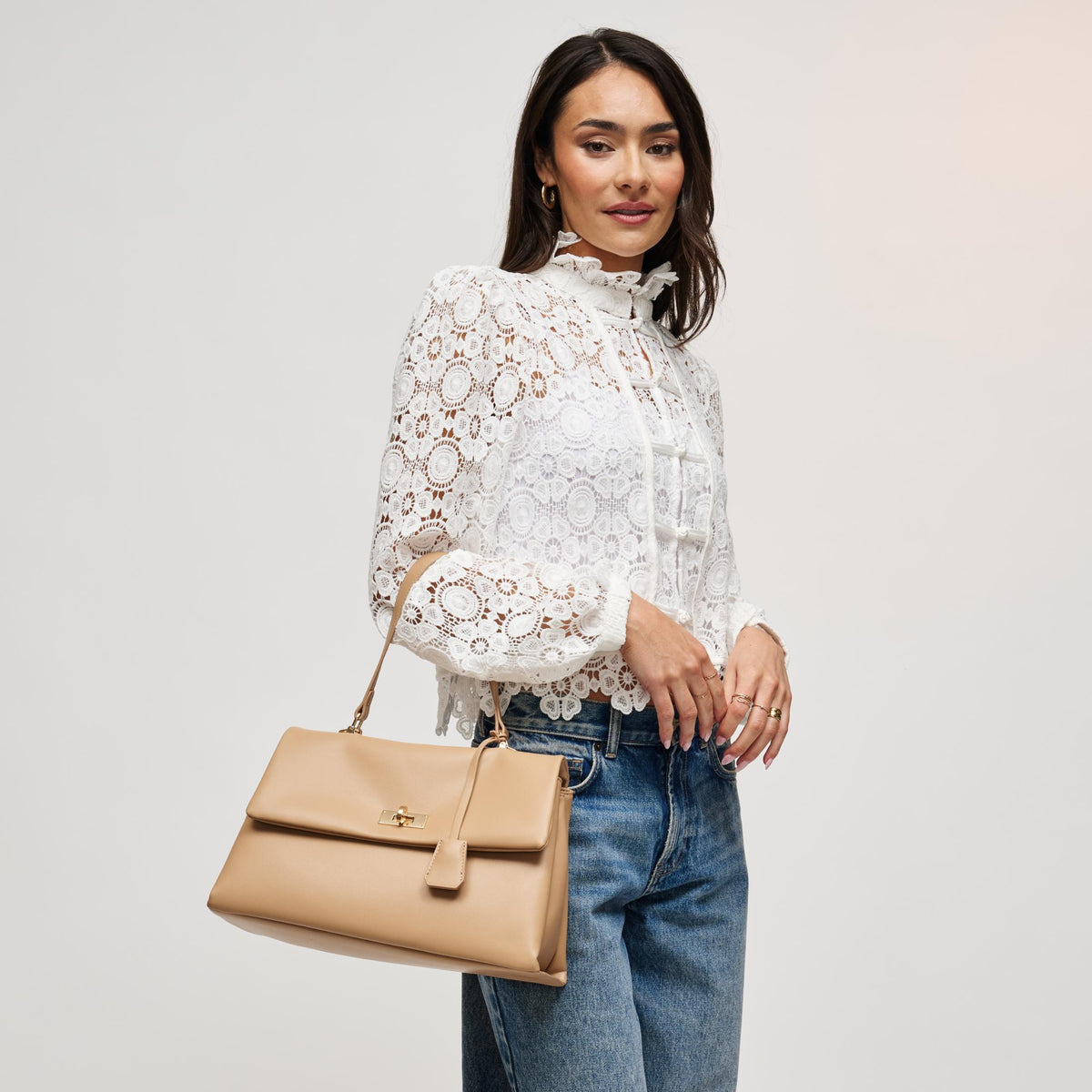 Woman wearing Natural Urban Expressions Arrow Satchel 840504212949 View 3 | Natural