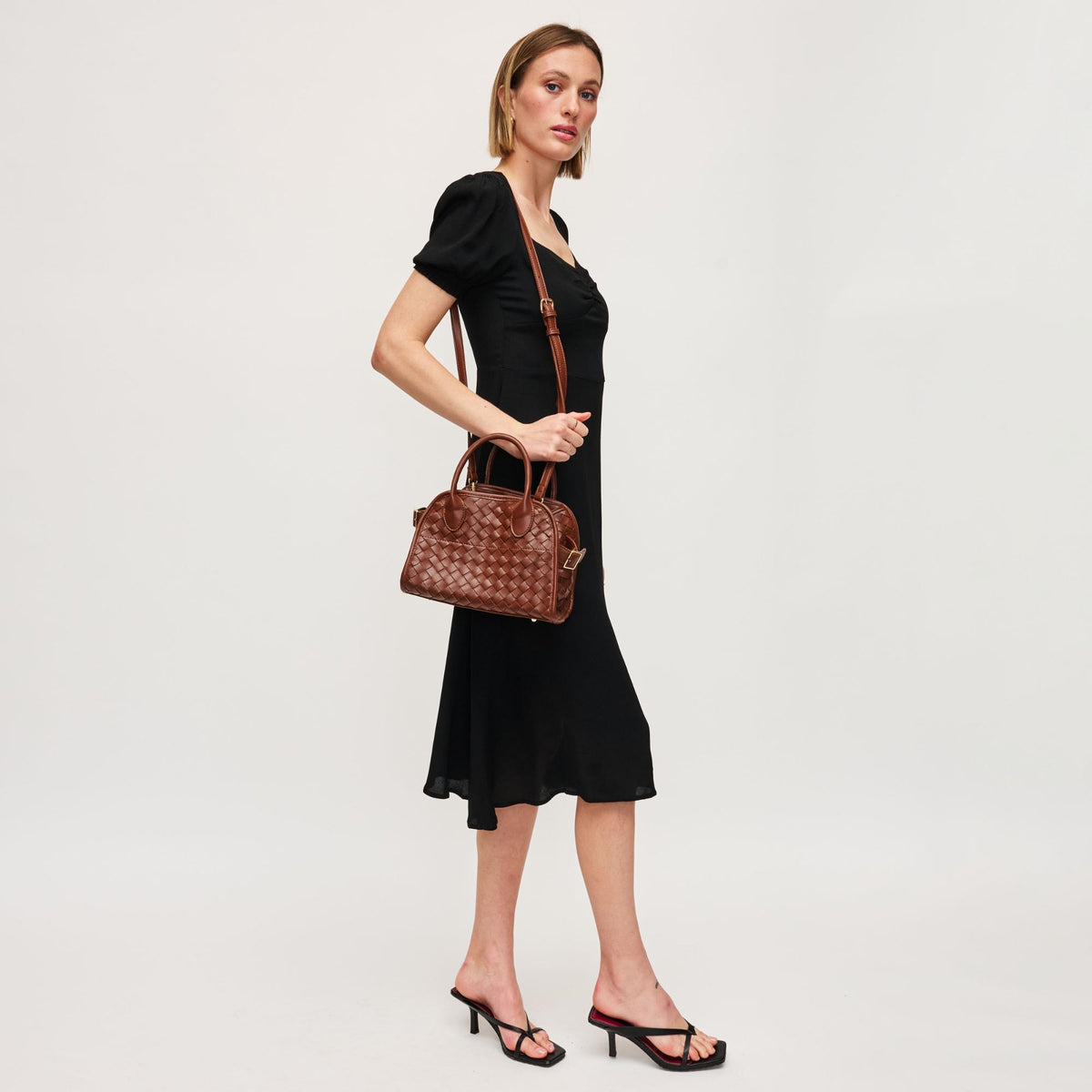 Woman wearing Chocolate Urban Expressions Kristie Crossbody 840611144942 View 4 | Chocolate