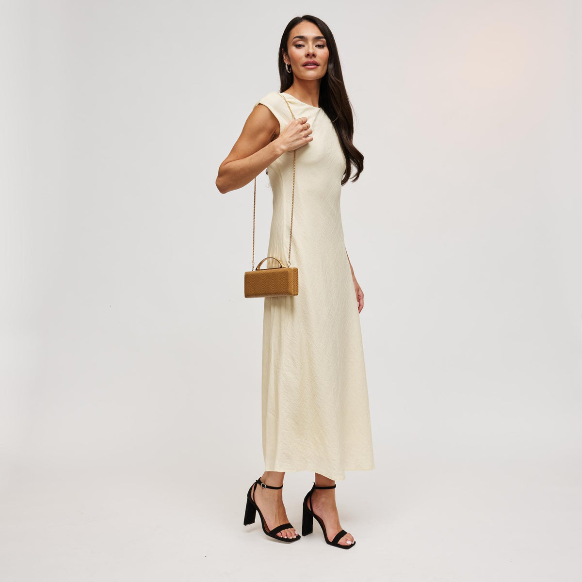 Woman wearing Mustard Urban Expressions Banks Clutch 840504212079 View 3 | Mustard