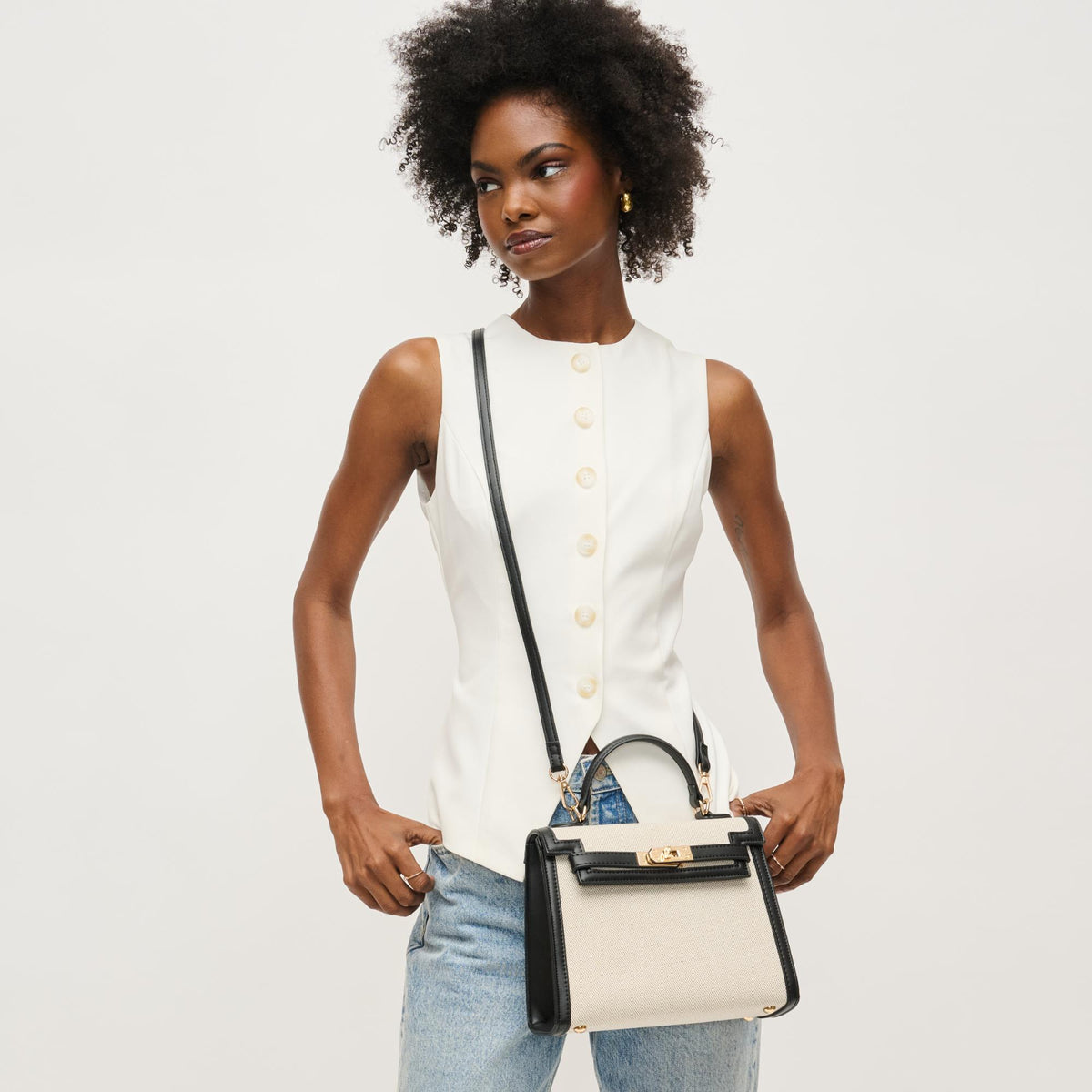 Woman wearing Black Ivory Urban Expressions Cher Clutch 840611146328 View 3 | Black Ivory