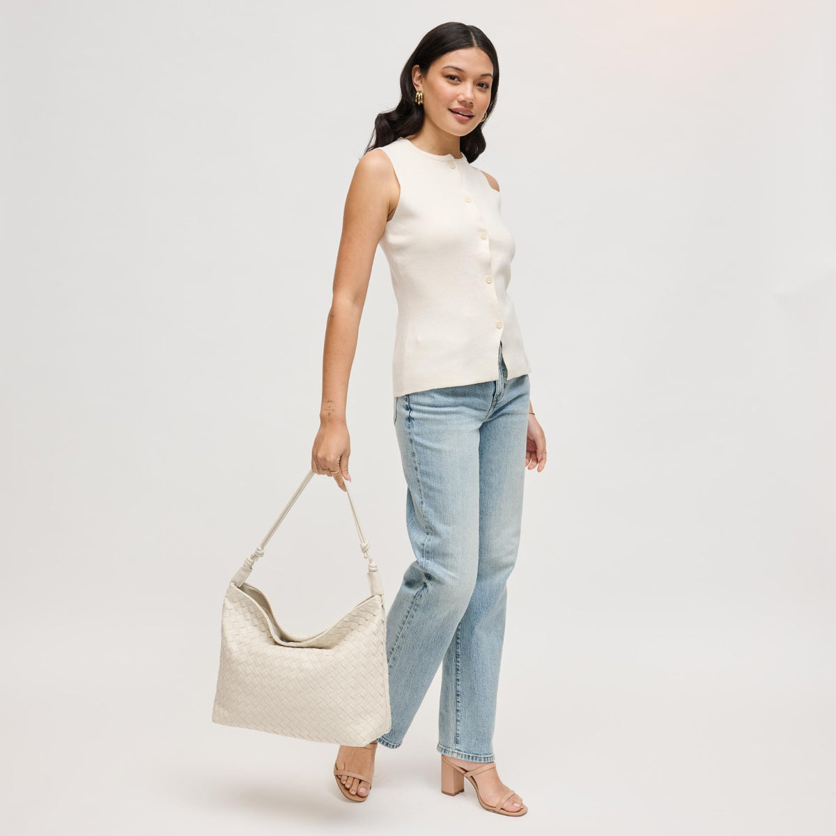 Woman wearing Ivory Urban Expressions Theo Hobo 840504205590 View 2 | Ivory